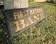 Large First National Bank Sign