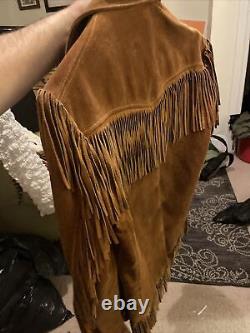 Vintage 1980s suede and fringe western style jacket. Cooper 5th Ave NY