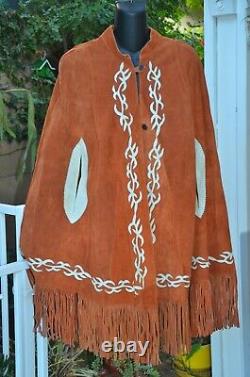 Vintage ladies Western wear fringed poncho, fancy leather floral deco, hand slits