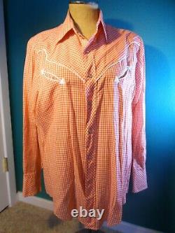 Vintage men's Western Wear long sleeved red and white checkered snap shirt